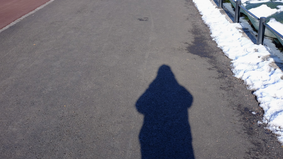 Chasing my Noon shadow, low sun.